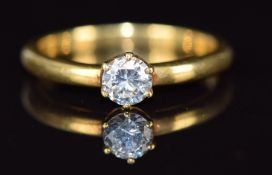 An 18ct gold ring set with paste, 3.4g, size N
