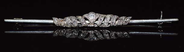 An 18ct white gold brooch set with old cut and rose cut diamonds, 3.2g, 6cm long