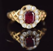 Victorian 18ct gold ring set with an emerald cut garnet and rose cut diamonds, 2.9g, size K
