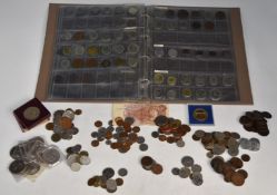An album containing world coinage 19thC onwards, includes some silver and a few Indian 'pirate