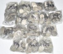 Approximately 9kg of UK post 1947 two shilling pieces