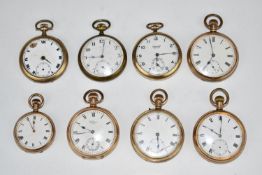 Eight gold plated keyless winding open faced pocket watches including Waltham, each with white