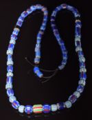 Venetian glass necklace made up of seventy six 19thC Venetian four, five & six layer blue chevron