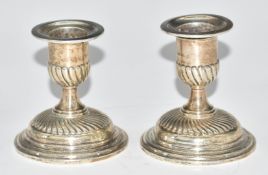 Pair of Victorian hallmarked silver squat candlesticks, London 1886, maker Horace Woodward & Co,