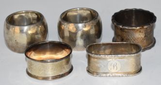 Five various hallmarked silver napkin rings, weight 154g