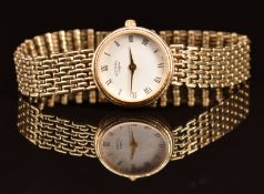 Rotary 9ct gold ladies wristwatch with gold hands, black Roman numerals, white dial and quartz