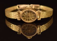 Bucherer 18ct gold ladies wristwatch with gold hands, baton hour markers and dial and Titoni 17