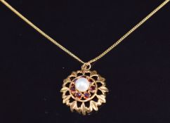 A 9ct gold pendant set with a pearl and garnets on 9ct gold chain, 4.4g, pendant 2.2cm and chain