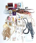 A collection of costume jewellery including tiger's eye necklace, vintage brooches, filigree