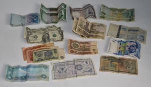 Twenty three world banknotes including four Shah of Iran 1961, three French West Africa 1949,
