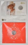Two Royal Mint silver £20 coin presentation packs comprising Christmas 2016 and The Queen's 90th
