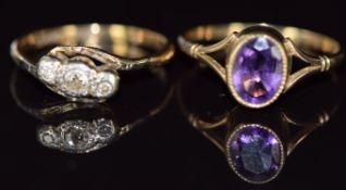 An 18ct gold ring set with three diamonds in a platinum setting (2.5g, size M) and a 9ct gold ring