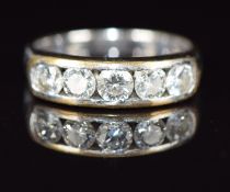 An 18ct white gold ring set with five diamonds, 3.7g, size I