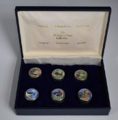Boxed limited edition set of six hallmarked silver and enamel pill boxes with decoration of birds,