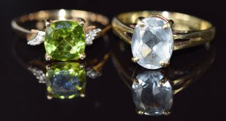 Two 9ct gold rings, one set with a peridot and diamonds and the other aquamarine, 6g, size P