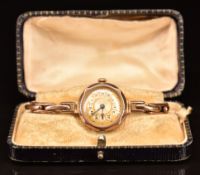 Unnamed 9ct gold ladies wristwatch with blued Breguet hands, silver and gold dial, Arabic numerals