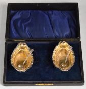 Cased pair of Victorian or Edward VII hallmarked silver salts with gilt interiors, Birmingham