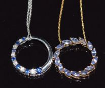 A 9ct white gold pendant set with sapphires on 9ct white gold chain and a 9ct gold pendant set
