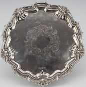 Edward VII hallmarked silver salver with shaped edge, raised on three feet, Sheffield 1905, maker