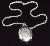 Victorian silver locket on silver rope twist chain, 39.6g
