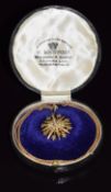 Edwardian 9ct gold star pendant set with seed pearls, Chester 1907, (diameter 2.5cm) on 9ct gold