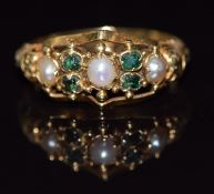 Victorian gold ring set with split pearls and tourmaline with embossed decoration to the