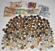 A collection of overseas coinage, largely holiday change, 1922 onwards, some banknotes, together