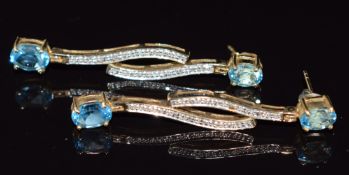 A pair of 9ct gold earrings set with blue topaz and diamonds, 6.8g, 5cm