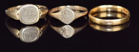 A 22ct gold wedding band (3.4g, size N) and two 9ct gold signet rings, 3.9g, sizes O & Q