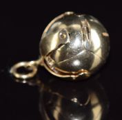 A silver and 9ct gold Masonic unfolding ball charm