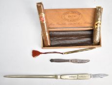 Georg Jensen hallmarked silver butter knife, Lomard Banking paper knife, two cigars (one Henri