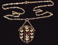 Edwardian 9ct gold necklace set with an oval garnet with foliate decoration, 4.7g, pendant section