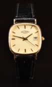 Rotary 9ct gold gentleman's wristwatch with date aperture, gold hands and hour markers, champagne