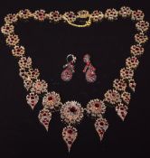 Victorian silver gilt necklace and earrings set with garnets