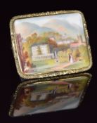 Victorian pinchbeck brooch set with a painted porcelain landscape miniature possibly depicting