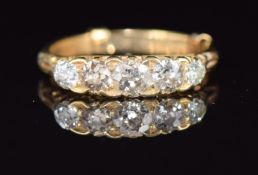 Victorian 18ct gold ring set with five diamonds, the centre diamond approximately 0.3ct, 3.7g,