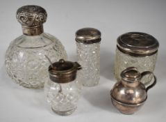 Silver mounted cut glass items including globe shaped perfume bottle, height 10.5cm, together with a