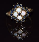 A 9ct gold ring set with sapphires and opals, 3g, size H