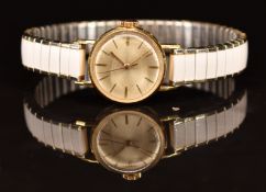 Cyma 18ct gold ladies wristwatch with gold hands and hour markers and silver dial, on gold plated