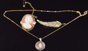 A 9ct gold leaf brooch, 9ct gold cameo pendant and brooch, 10g