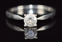 A platinum ring set with a round brilliant cut diamond of approximately 0.45ct, 3.3g, size L