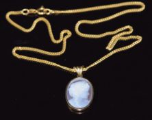 A 9ct gold pendant set with an agate cameo of a young woman on 9ct gold chain, pendant 2cm and chain