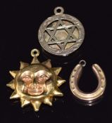 Three 9ct gold pendants / charms in the form of a sun, horseshoe and a star of David, 5.8g,