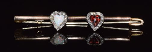 Victorian brooch set with a heart cut opal and garnet surrounded by rose cut diamonds, 4.7g, 5.5cm