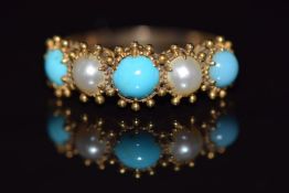 Victorian ring set with split pearls and turquoise cabochons with embossed decoration to the