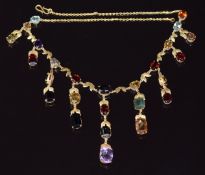 A gilt necklace set with tourmaline, amethyst, garnets, zircons and quartz