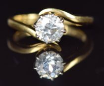An 18ct gold ring set with a round cut diamond of approximately 1ct, 3.6g, size L