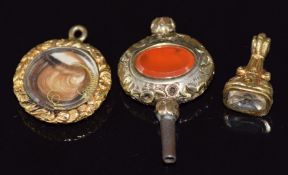 Victorian locket with engine turned decoration and set with hair, Victorian seal and a Victorian