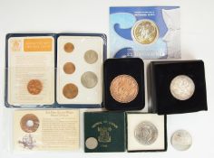 A group of coins including silver Britannia 1935 crown, Festival of Britain etc