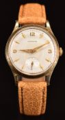 Garrard 9ct gold gentleman's wristwatch with inset subsidiary seconds dial, gold hands and hour